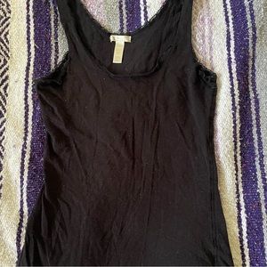 Black tank top by the brand Ambiance
